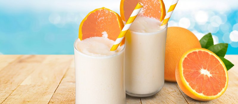 Orange,Smoothies,On,Old,Wooden,Background.